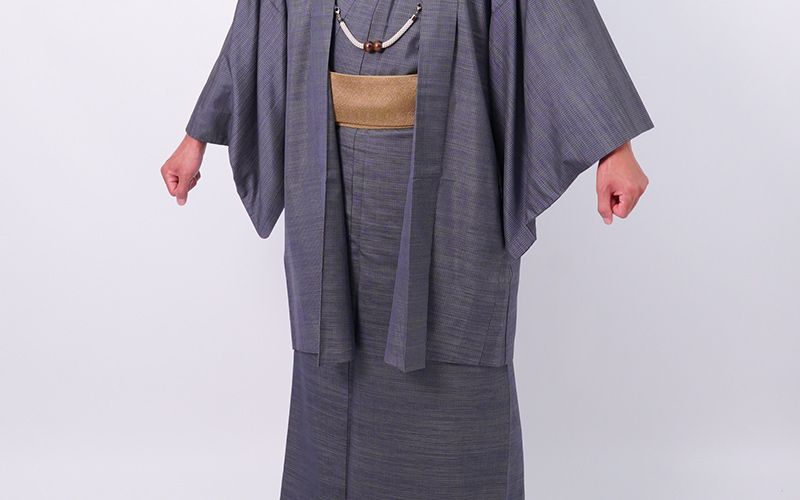 大島紬を着た男性